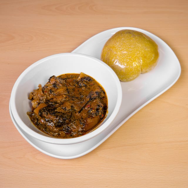 Bitter Leaf soup Goat meat -Eba.